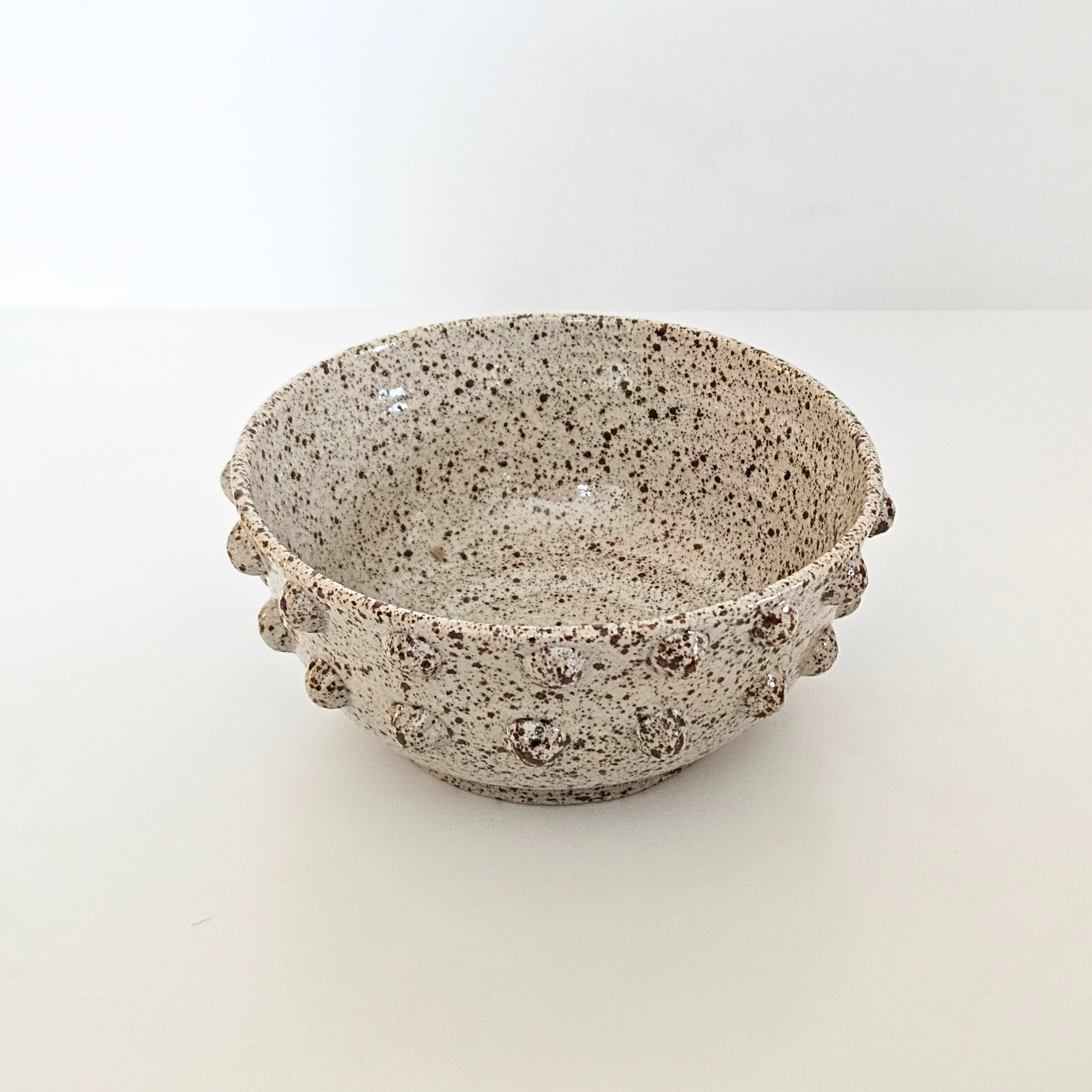 Volcanic sand bowl with spheres