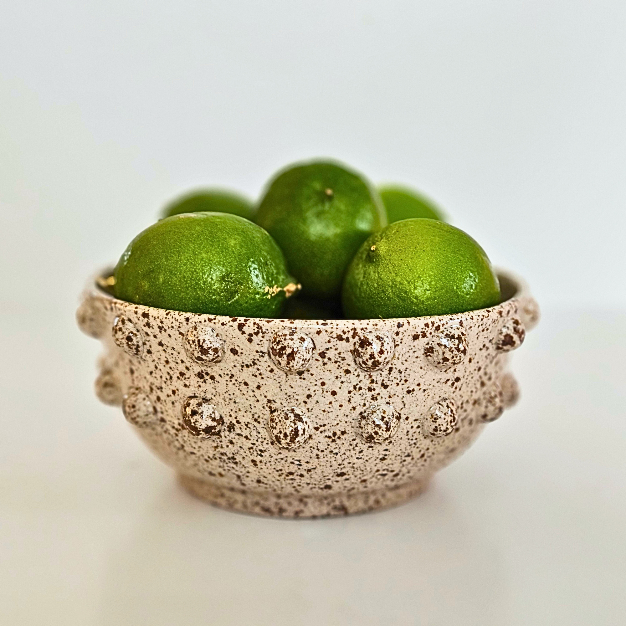 Volcanic sand bowl with spheres