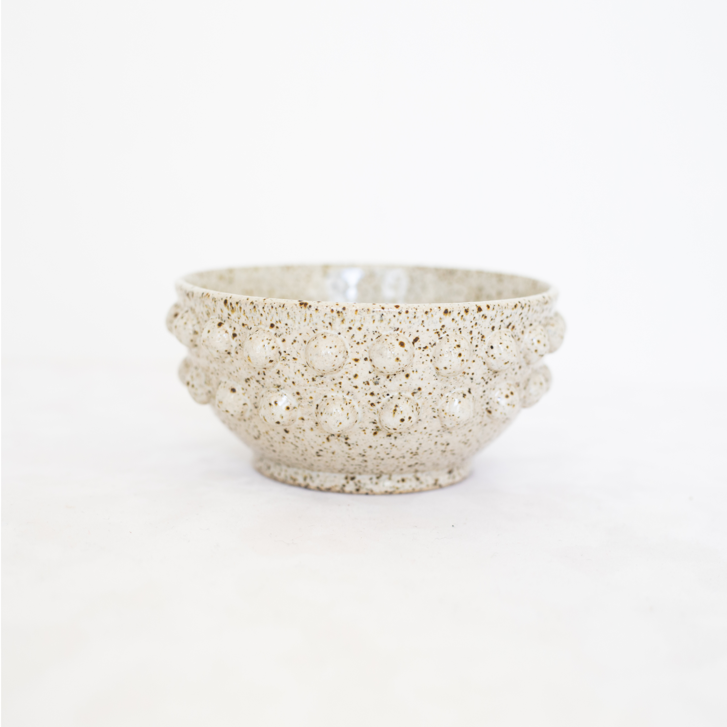 Volcanic sand bowl with spheres