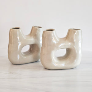two organic shape vases