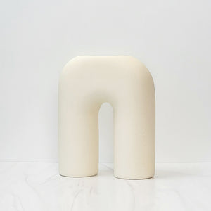 White U shaped Zo vase.