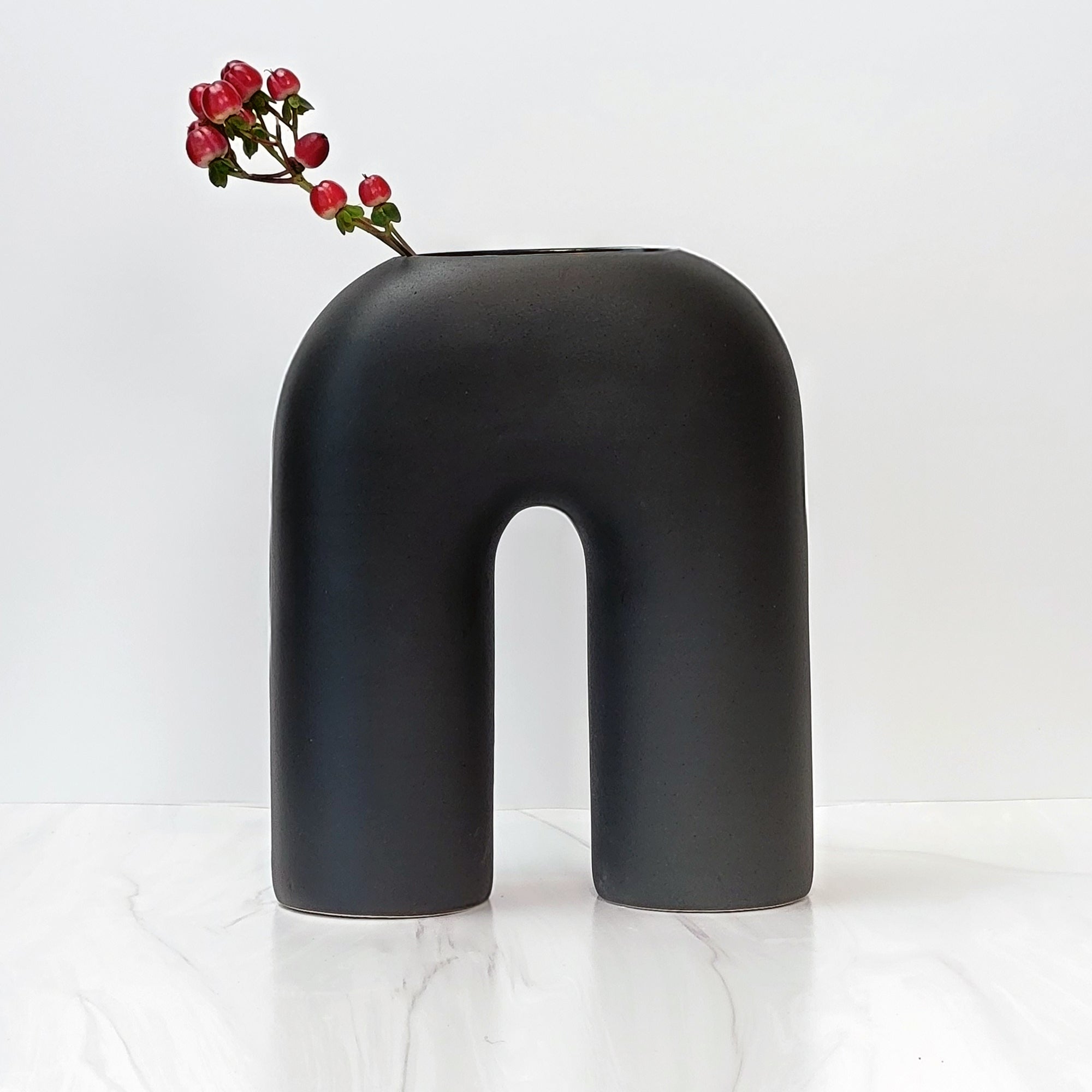 Black U shaped Zo vase.
