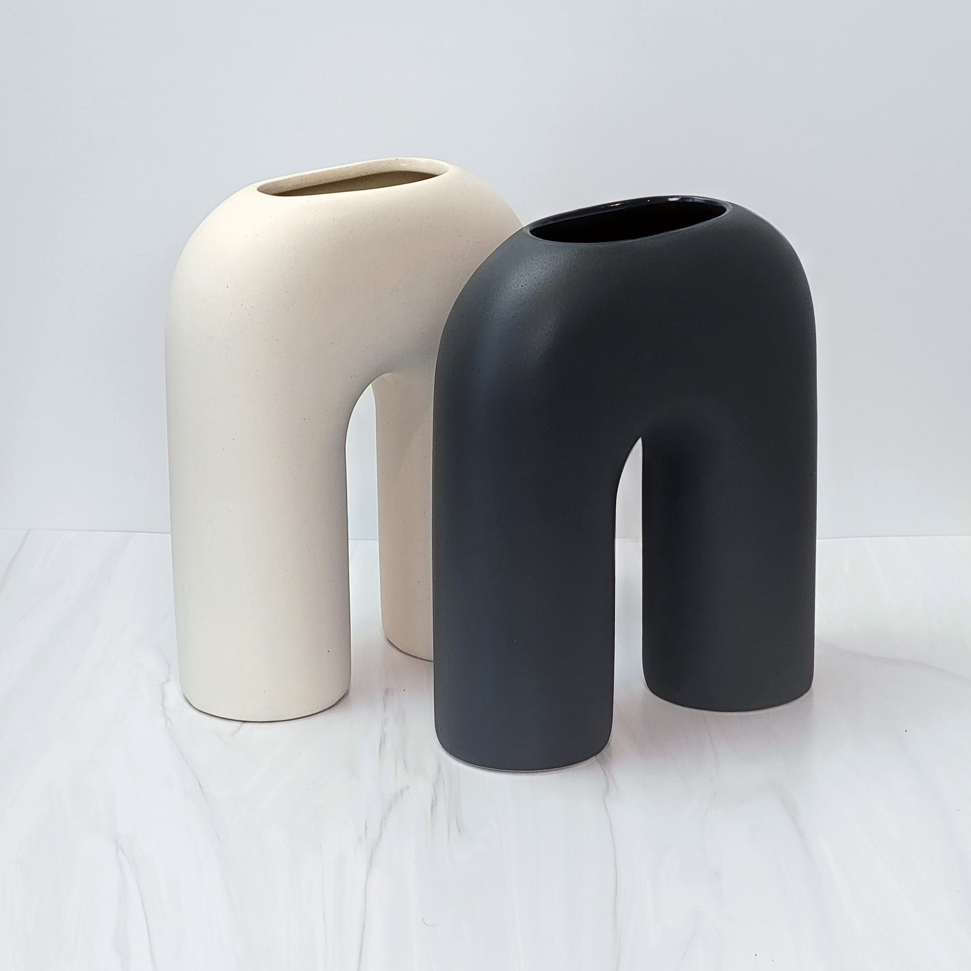 Black and white U shaped Zo vases.