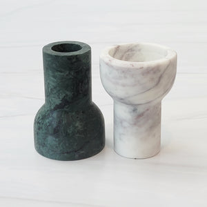 green and white marble como candleholders by aaron probyn