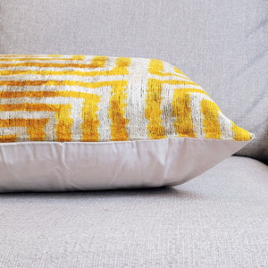 Golden geometric silk velvet ikat pillow