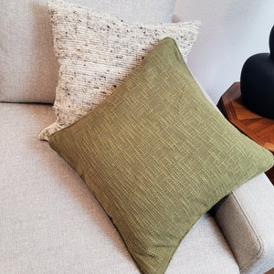 olive textured cotton pillow and medellin woven pillow