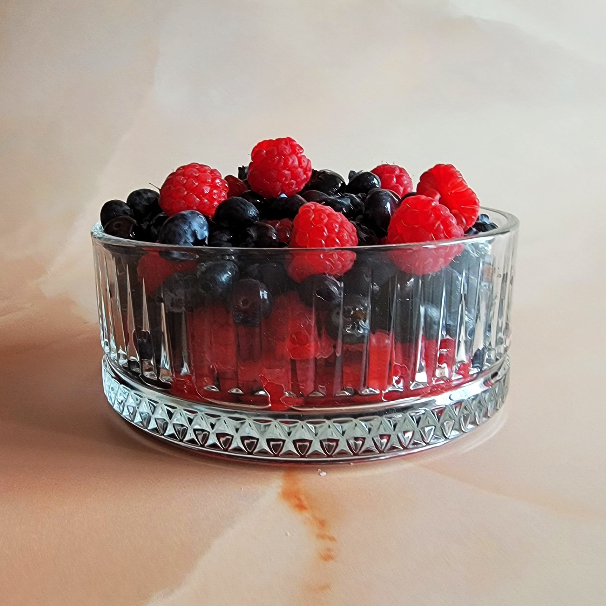 fluted glass bowl with berries