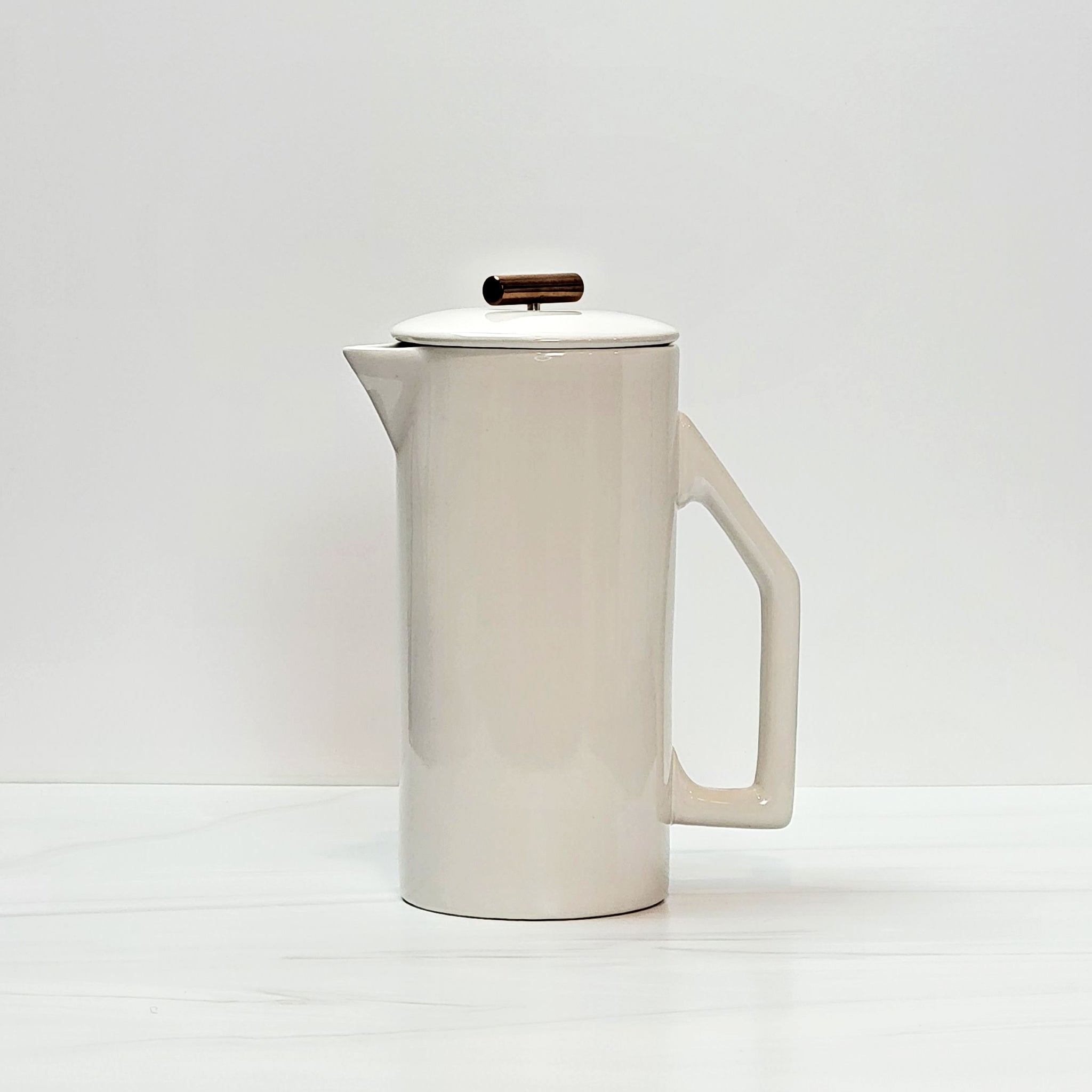 Ivory ceramic french press.