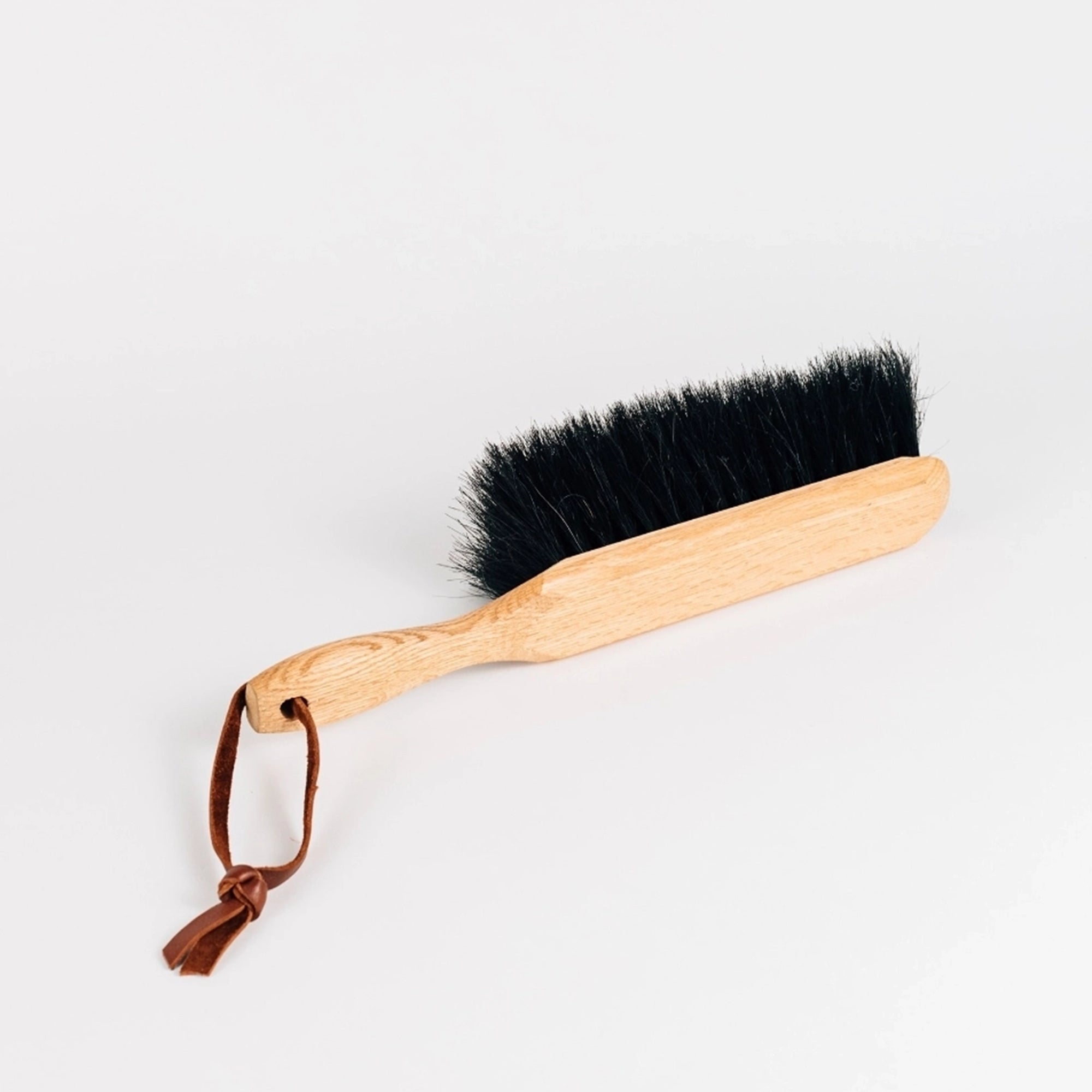 Horsehair and wood dust brush