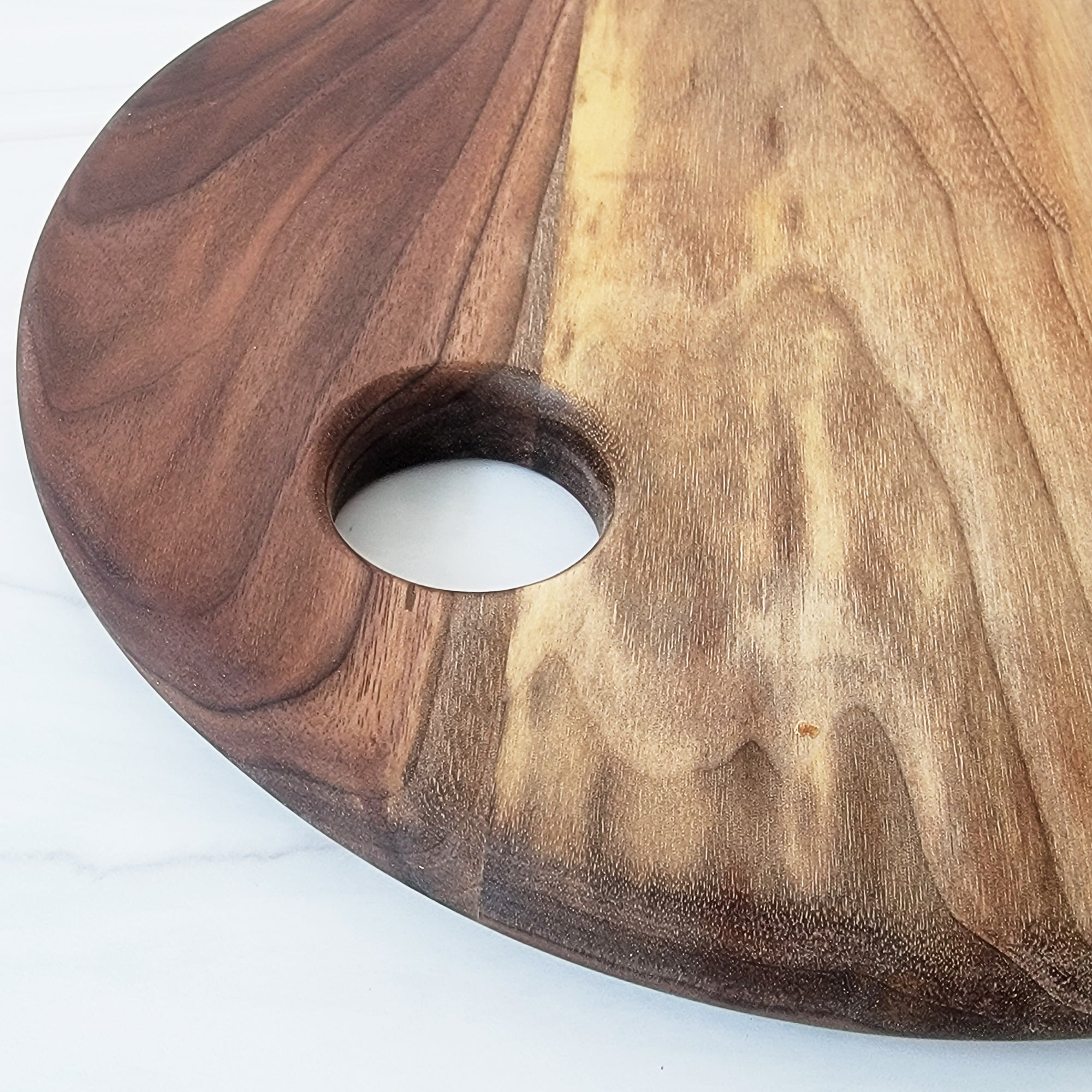 Round ambrosia maple wood cutting board