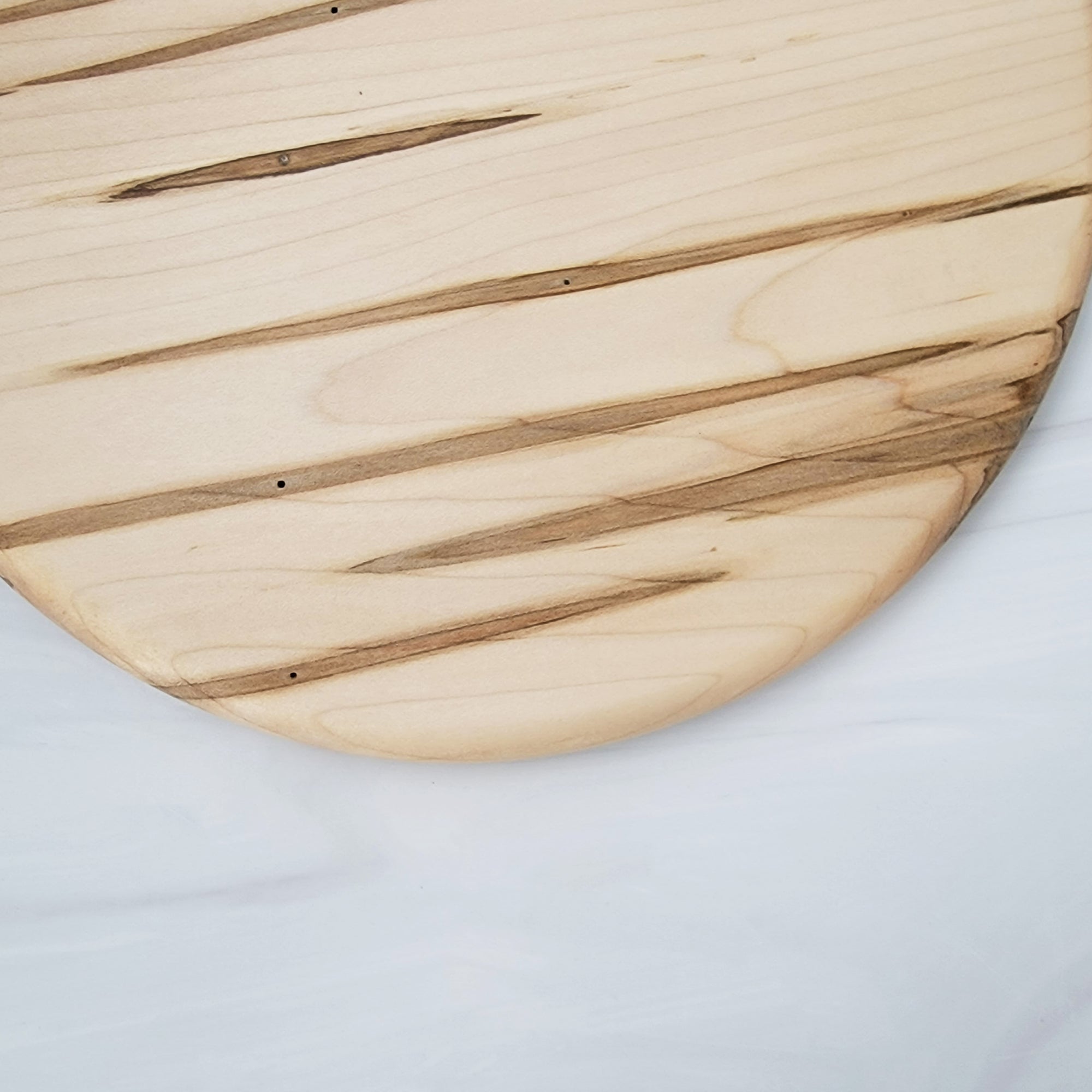 Round ambrosia maple wood cutting board