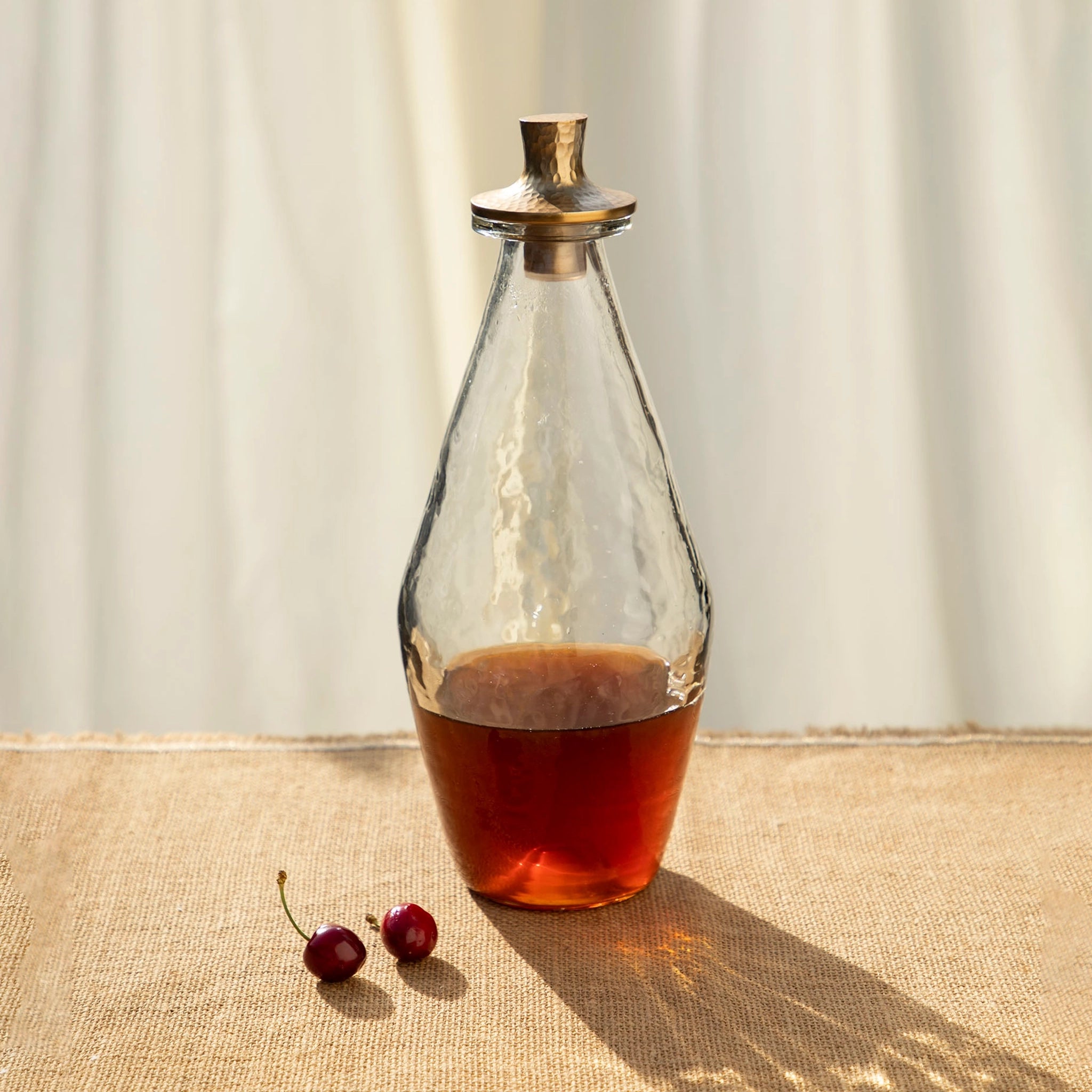 Pebbled glass and brass & steel decanter