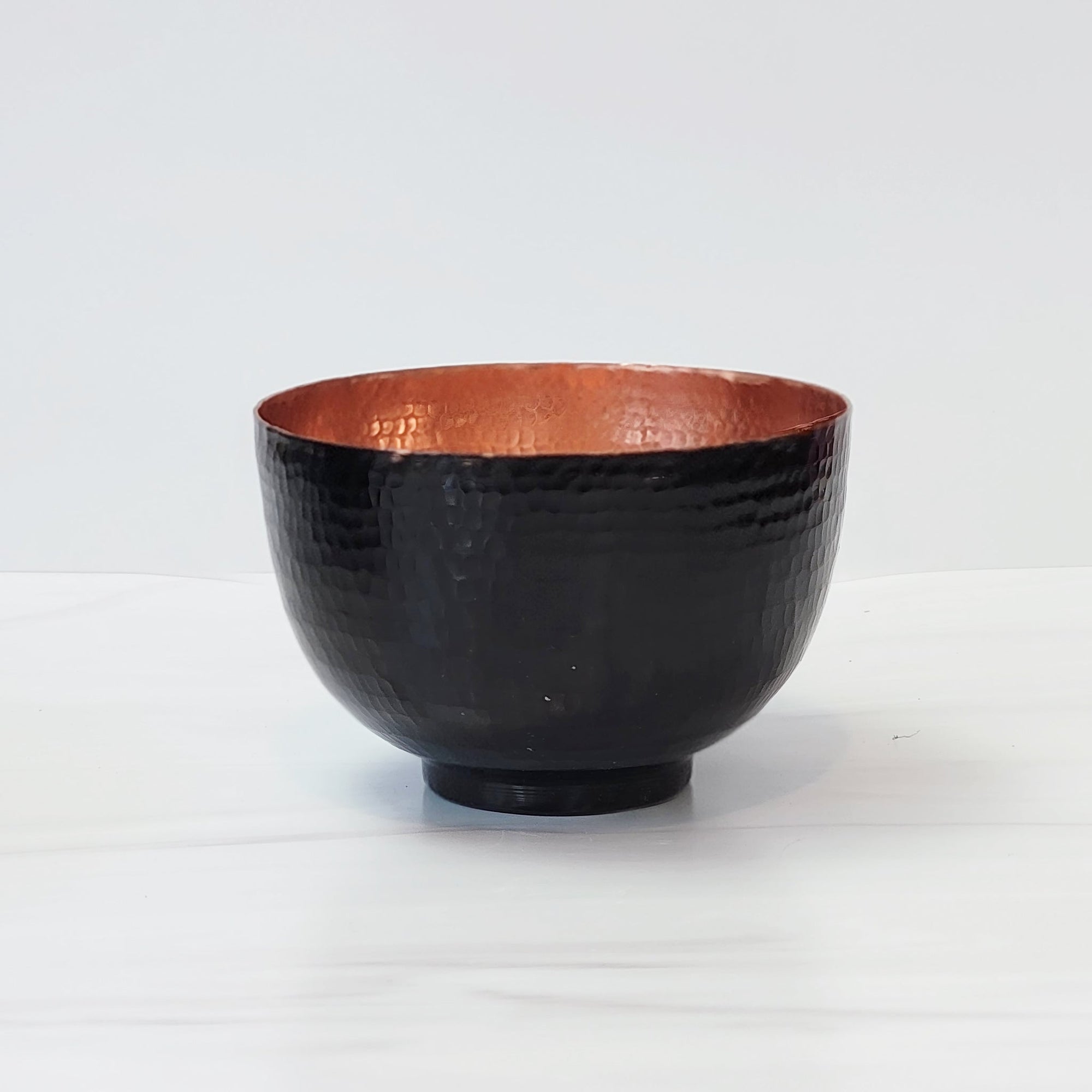 Lacquered and blackened hammered copper bowls