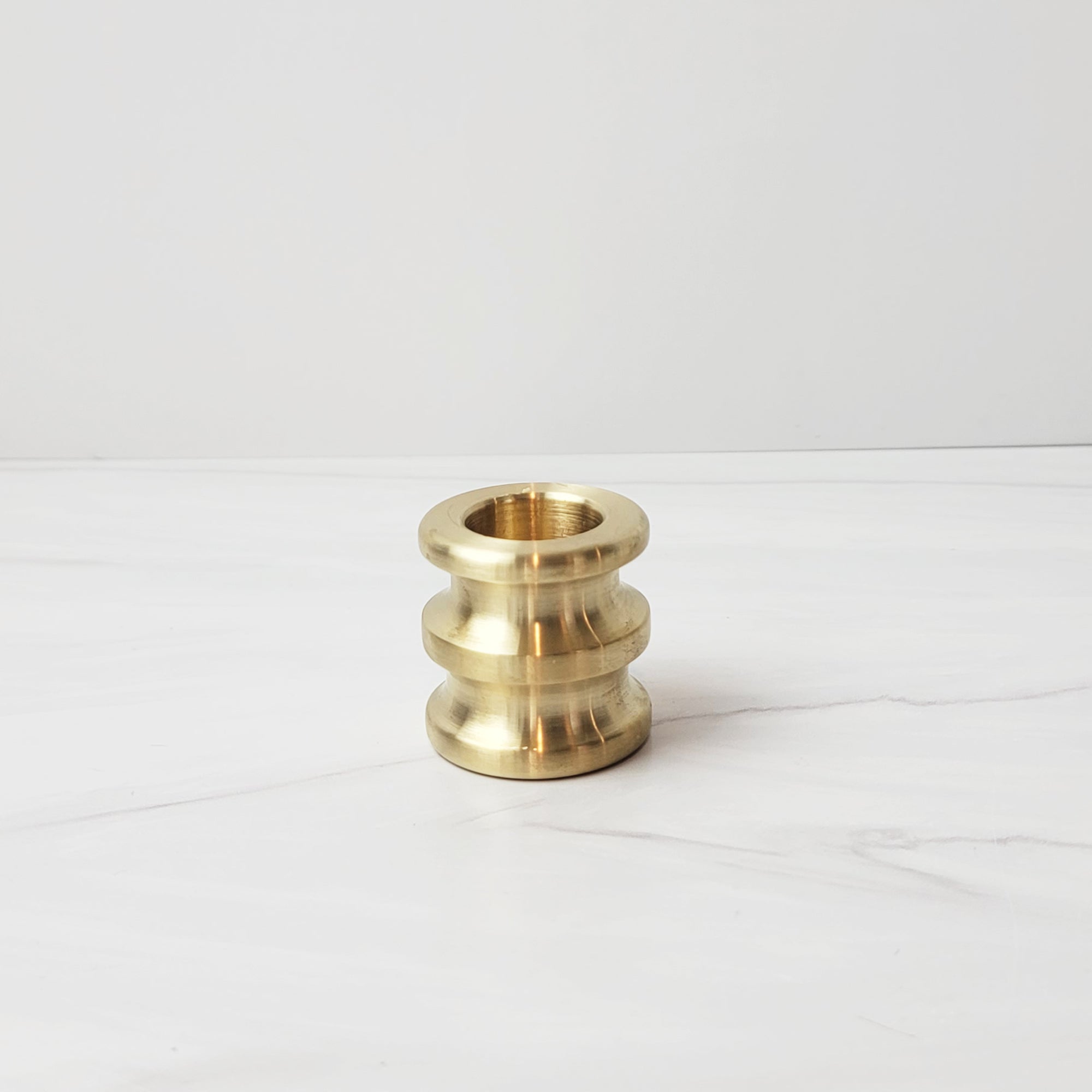 small sway brass candlestick
