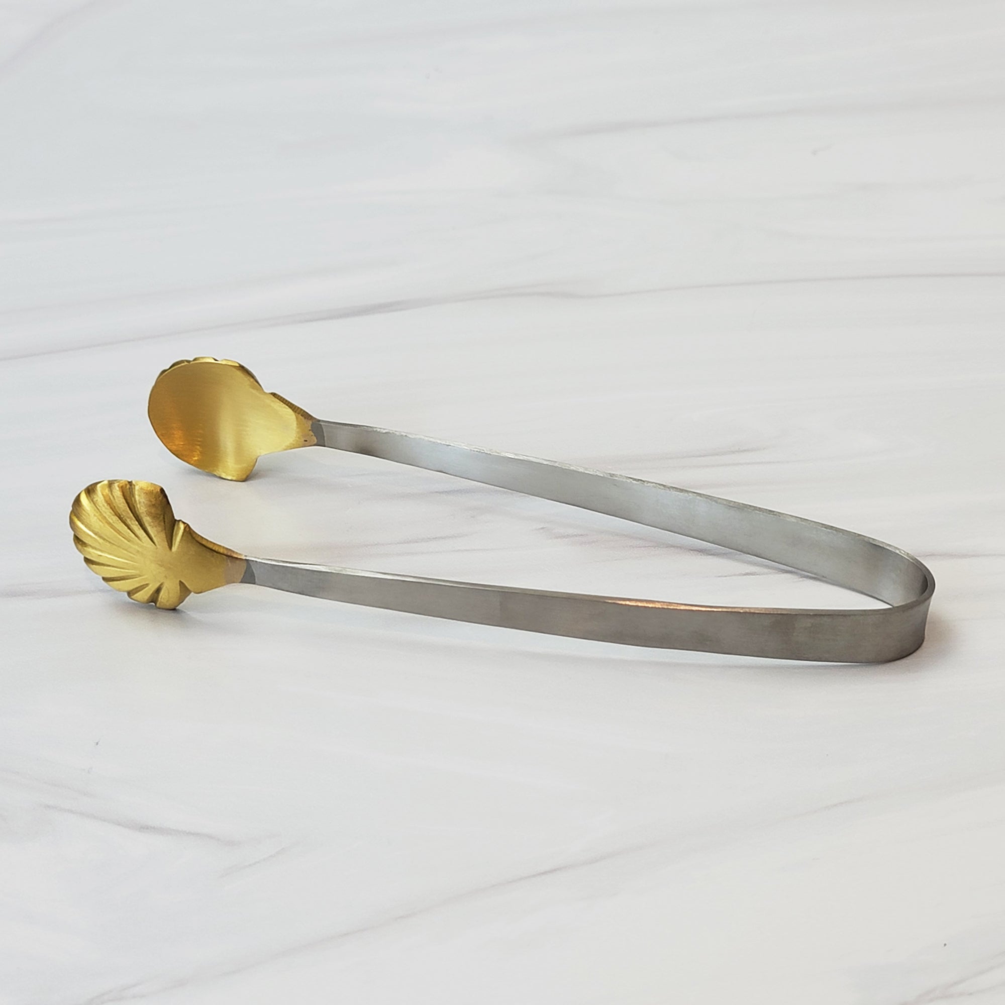 Brass and stainless steel art deco seashell tongs