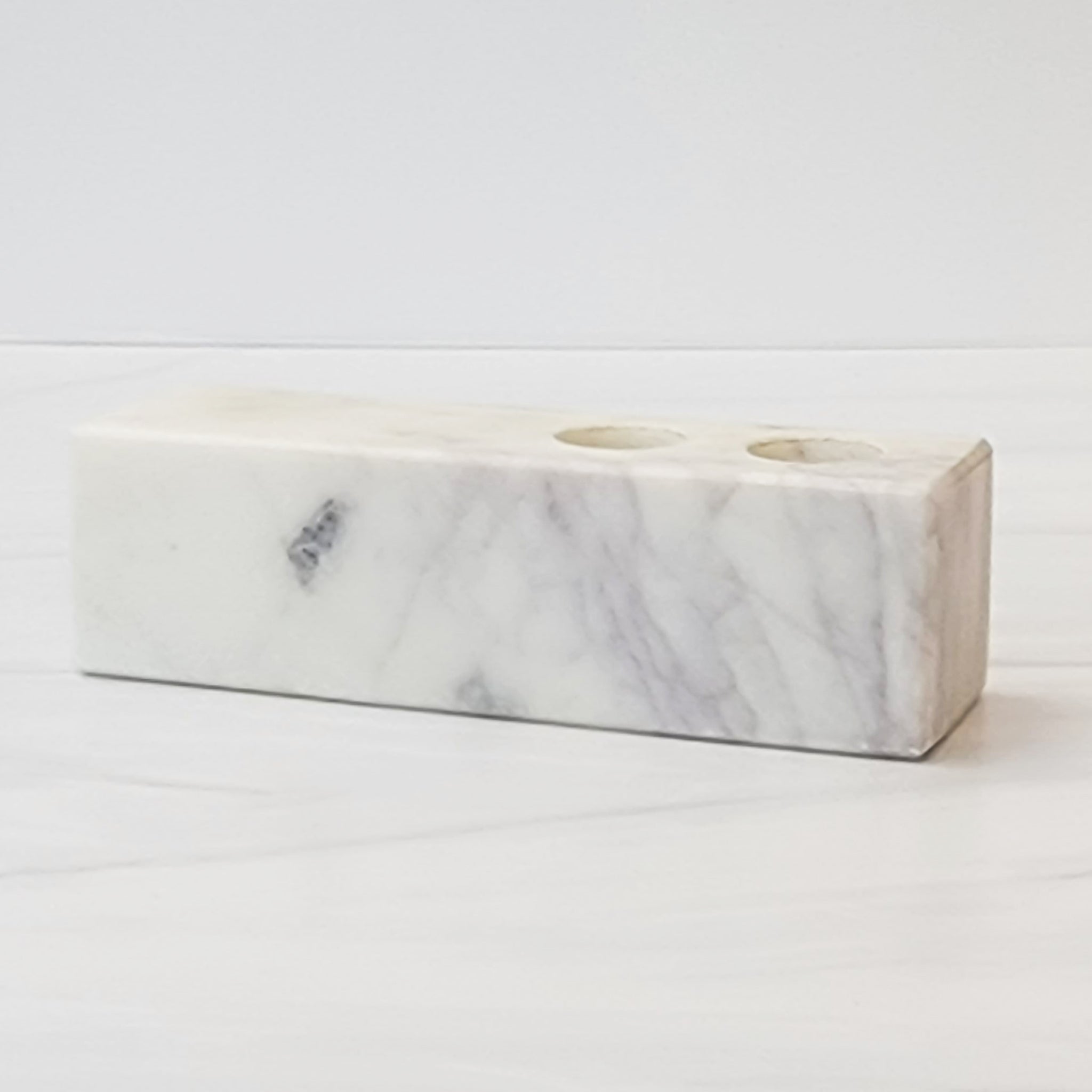 Asymmetrical marble double taper candleholder