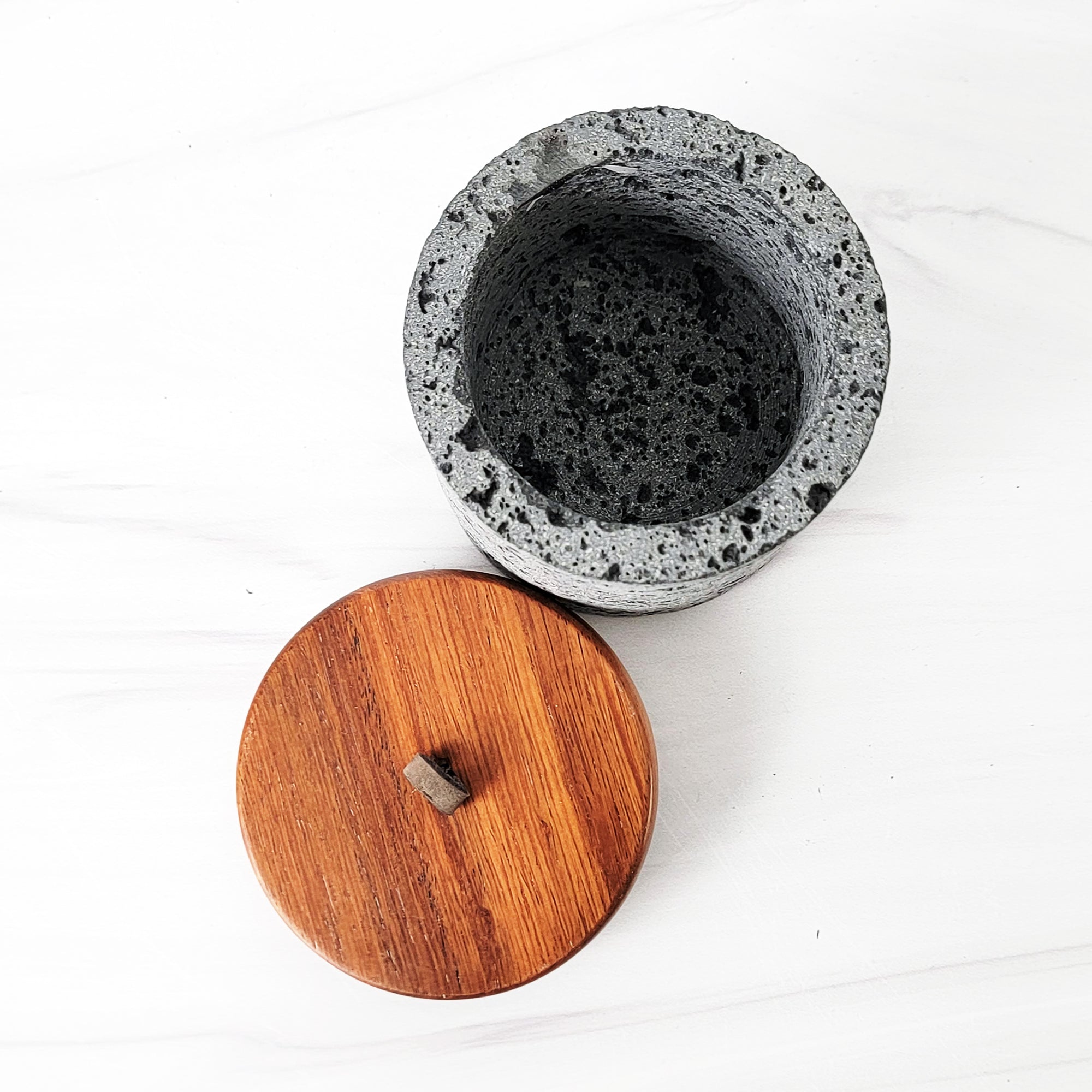 volcanic stone and wood jars